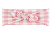 Pink gingham headband for little girls from By Bella Boutique.